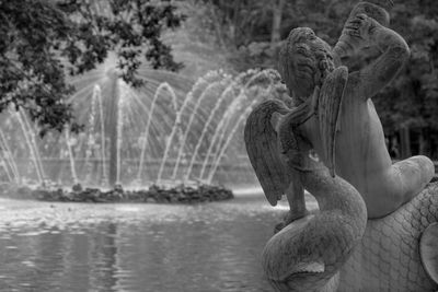 View of statue by lake