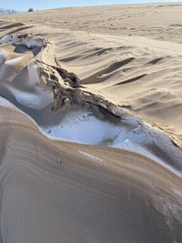 Sand with little snow