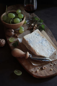 Blue cheese with walnuts, grapes. gorgonzola cheese.