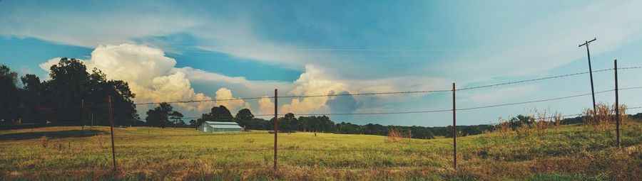 View of landscape against cloudy sky