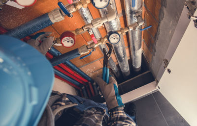 Low section of man working at workshop