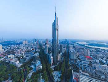 High angle view of city buildings against sky