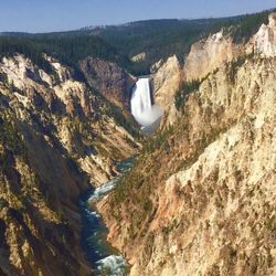 Scenic view of river flowing through rocks