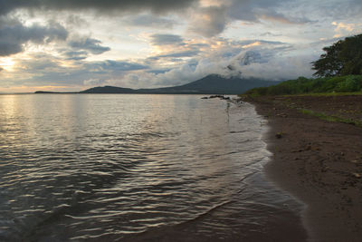 Scenic view of sea against sky during sunset