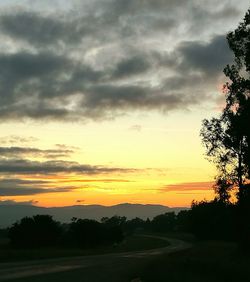 Scenic view of dramatic sky over landscape