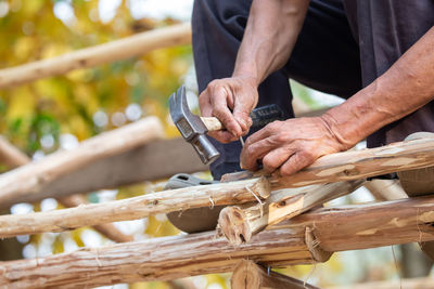 Man working on wood