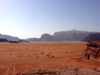 Scenic view of desert against clear sky