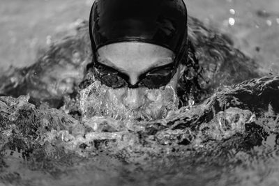 Woman swimming in pool