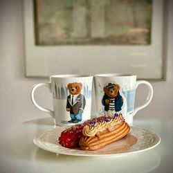 Chocolate cake with coffee served on table