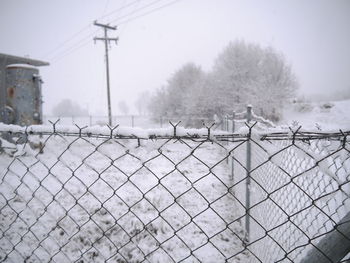 Chainlink fence against sky