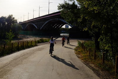 People walking on bridge