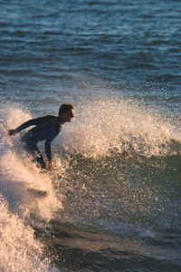 Man surfing in sea