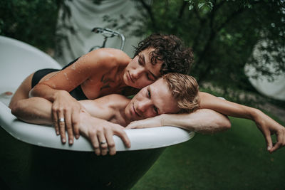 Portrait of a mother with baby in water