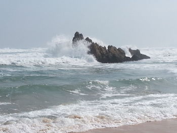 Waves splashing on beach