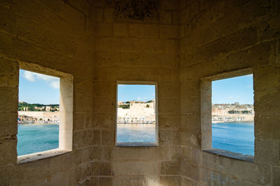 Buildings seen through window