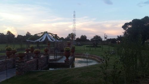 Scenic view of landscape against cloudy sky