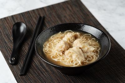 High angle view of noodles in bowl on table