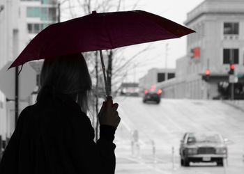 Rear view of woman in snow