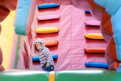 Children playing with toy on playground