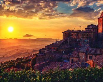 High angle view of townscape against sky at sunset