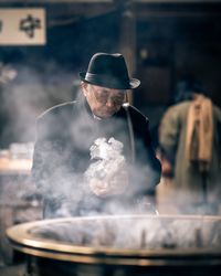 Close-up of man smoking cigarette