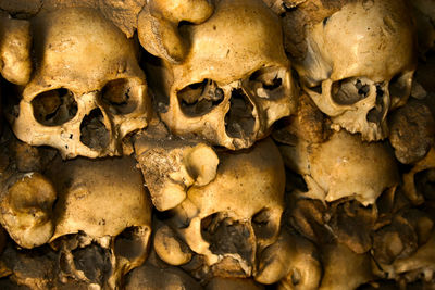 Full frame shot of human skulls at catacombs