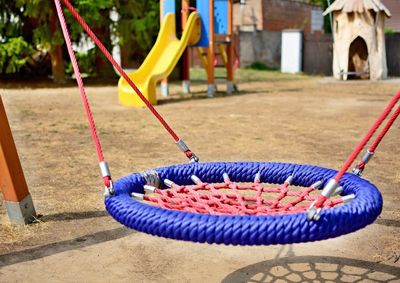 Close-up of swing in park