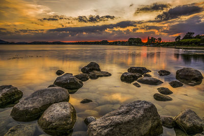 Scenic view of sea against sky during sunset