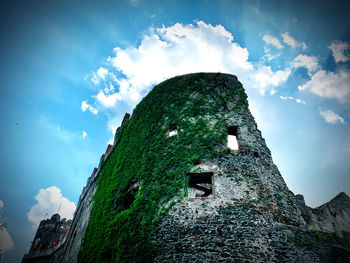 Low angle view of old building against sky