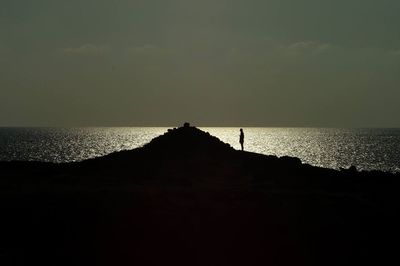 Scenic view of sea at sunset