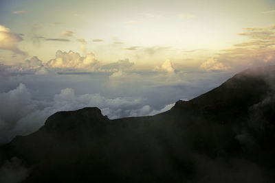 Scenic view of mountains against sky during sunset