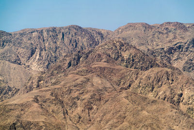 Scenic view of mountain range against clear sky