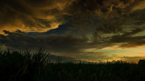 Scenic view of dramatic sky during sunset