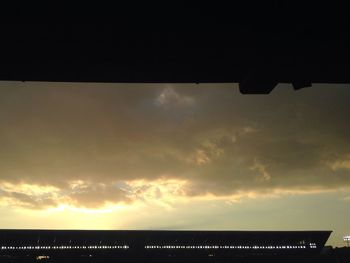 Low angle view of cloudy sky at sunset