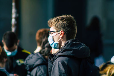 Portrait of man sitting on stage