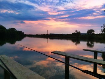 Scenic view of lake at sunset