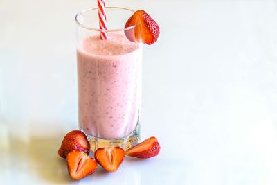 Close-up of strawberry in glass on table