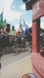 Horse cart against sky