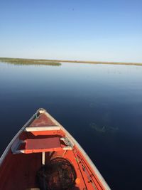 Scenic view of calm sea against clear sky
