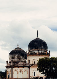 Low angle view of mosque against sky