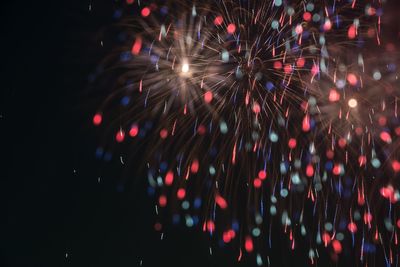 Firework display at night