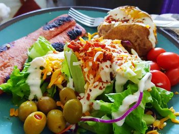 Close-up of served food in plate