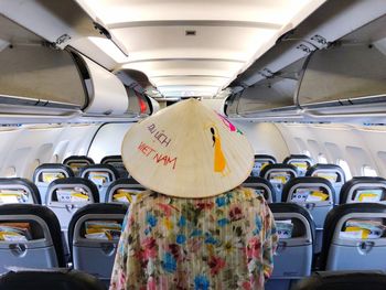 Rear view of seats in airplane