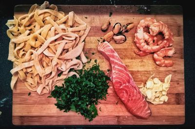 High angle view of chopped vegetables on cutting board