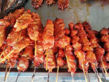 High angle view of meat on barbecue