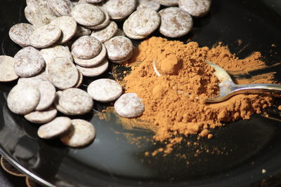 High angle view of pebbles in container