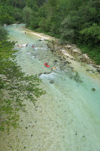 High angle view of people on river