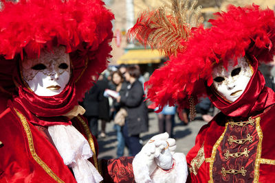 Men wearing venetian mask during carnival