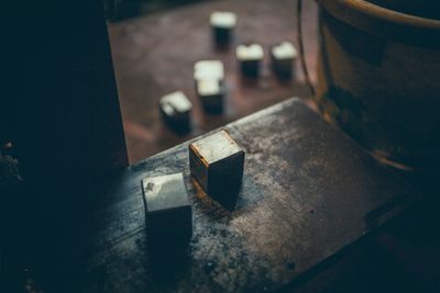High angle view of rusty metal on table