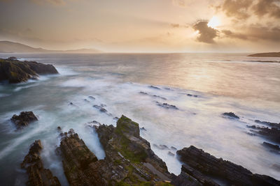 Scenic view of sea against sky during sunset